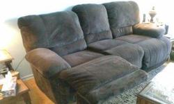 Like new three seat sofa with recliner on each end, scotch guarded, like new
