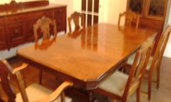 Just in time for Christmas   Beautiful Antique 9 Piece Dining Suite
Dark Walnut dining table, 6 chairs including arm chair, buffet and china cabinet.  Sorry terible pictures. Shown with folding hideaway leaf in, folds up to smaller table.  From the Bell
