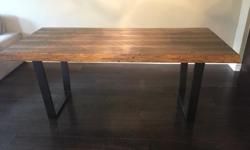 Solid maple live edge table with dark wood stain and modern steel base manufactured by 2Loons Home Furnishing. Table valued at $2,200. Asking $1,300 OBO. Dimensions are 6 feet long x 3 feet wide x 2 1/2 feet high (table is 2 inches thick). The purchased