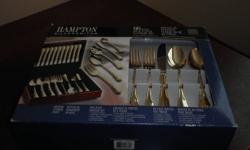 Absolutely stunning 66 pieces,gold plated flatware set.
 includes wooden storage chest,still in box,never displayed or used.
 regular price $399.00+tax
 asking $145..!!
 
 Cell(705)794-1669