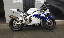 number 187 of 1000 this beautiful R1 turns heads where ever it goes , its got an akro slip on , leavers , grips and bar ends , stage 2 clutch , toby dampener , vortex rear sprocket, new chain ,tinted head light and beautiful one off paint . it has race