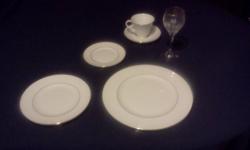 I have10 full settings.
Each setting has
-a Dinner plate
-Salad plate 
-Bread plate
- cup and saucer.
I also have many other items that go with the dishes. Including
-a Gravy boat
-an open vegetable dish
-a covered vegetable
-a cream and sugar set
-a 15