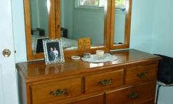 Colonial style bedroom chest of drawers and mirror (dresser) with two (2) matching night (end) tables. Good condition with minor scratches. Location is Lantzville (Nth Nanaimo). Moving Nov 5th must sell.