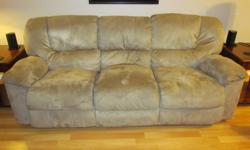 Microfibre Berkline reclining sofa with fold down tray and cup holder. In great condition and very comfortable! $300 OBO!