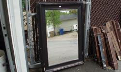 2 beautiful bevelled edge mirrors, approx. 25" wide, 37" long. $50.00 each