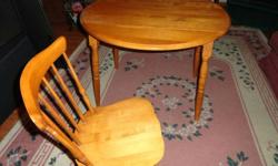 In good shape!! The table has fold down sides and four chairs