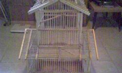 Custom built wooden cages with an articulate design,offering 3 levels.