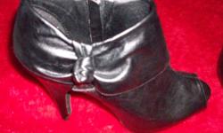 Beautiful boots.  Cuffed look.  Never worn.  Size 7 - 7-1/2.  Look nicer than pictures.  Please e-mail if interested, and check my other positings.  Thanks.  Reduced from $50 to $40.