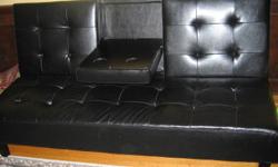 it is black in colour with built in coffee table 350 or best offer.