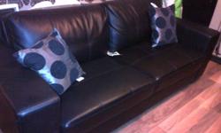 I have a three piece, black leather sofa set that must go, it is in great condition and was barely used. The set is complete with a couch, love seat and chair. Two couches still have tags attached to them. The back pillows are removable by velcro, and the