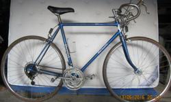 Go for an adVenture on your blue Venture 12 speed road bike! Everything works, all it needs is some tape and plugs on the handlebars. 27' wheels. It has some light surface "patina" surface rust on the frame, but is otherwise is in very good condition.