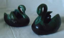 Two swans, two elephants, two trumpeting birds, one poodle, one small vase. Should be $5 to $15 each. This is $20 for all.