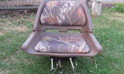 One blue and white seat, 25.00, one CAMO seat new with adjustable attachment for attaching to bench in boat 50.00