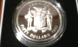 BOB MARLEY $50 COIN  / .925 SILVER / 28.28 GRAMS
BRITISH MINT RELEASE, ONLY 30,000 STRUCK IN 1995-1ST EDITION
IMPOSIBLE TO OBTAIN,OTHER THAN  THE AUCTIONS CIRCUIT
PROTECTIVE CASE NOT OPENED, FIRM PRICE !