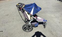 in good condition. Comes with cup holder, rain cover, car adapter, kid's tray and matching diaper bag.