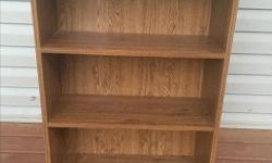 Used laminate Bookshelf, you pickup or delivery to shawnigan/mill bay for $5