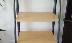 Wood and metal bookshelf. In gently used condition.