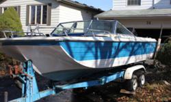 Bowrider motorboat, great for fishing or towing your kids, Blue and White fiberglass hull, with a 70 hp motor, hydrolics, electric start, 2- new gas tanks, 2 new batteries with dual battery switch, fish-depth finder, airtube with tow rope, boarding