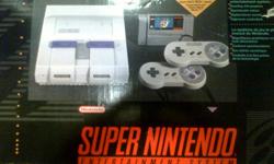 A very good condition SNES in its original boxed. Works perfectly, comes with both RF and RCA tv hooks up as well as the power adapter. Also comes with 2 controllers and all the original manuals. SNES is also in original plastic packaging. Taking offers