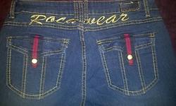 New with tags. Never worn Size 11 memory stretch Rocawear jeans. Fits like a size 9. Retail price is 74$ US.