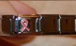 Local buyers only please -- I do not send things through the mail
Amorini Italy blank charm bracelet, with one charm, a pink breast cancer awareness ribbon.
Purchased several years ago at Candies of Merritt chocolate/gift store, never worn.
$10 OBO