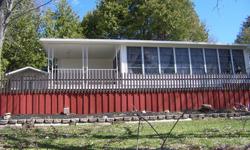 King of the Hill 42ft 2006 Breckenridge Cottager with 3 season add-a-room. Two bedrooms one has bunks. Overlooking green space. Located at Cedar Cove Resort White Lake Ontario