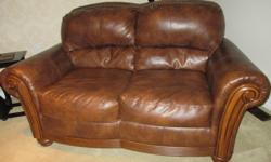 Perfect condition Blended Leather Sofa - 2 seat
Well cared for, comfortable, Smoke + Pet free home.
Stud detail around top back + carved wood on front.
$300.
Also have matching 3 seater for $250. see other ad - buy both for $500 or make me an offer!