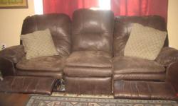 In good shape,rustic `worn`look and is real leather( sueade) ,just need gone asap as we are picking up new set today!!!!!! 200.00 obo for the whole set,relcling set comes apart in 3 pieces for easy move,comes from smoke free home
 
if you come asap best