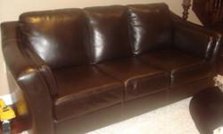 Almost new brown leather love seat and sofa.  Will match almost all decor.