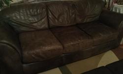 All leather brown Sofa and love seat set. Laura Ashley brand. 20 years old but excellent condition. Cushions on back new foam. One tear in seat cushion but fixed. All cushions removable. To be sold ASAP.