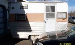 This trailer is great for small outings. The bed converts into a table with two bench seats.
Has an ice box, 3 burner range, but no heater, it never did. Will be a great trailer to take to May long weekend.
