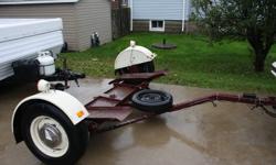 I have a car dolly for sale. No Brakes, this is accepted safe, by Transport Canada, for a tow vehicle up to 35feet with a TWR of 3000 lbs. Harness included, not shown on pictures. Do not require it. Still in good shape.The car dolly is located in