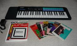 Casio CA100 Tone Bank Keyboard, 49 Full Size keys,in excellent condition. Includes AC adapter, Learn to play piano book + various music/song books for keyboard by popular artists,.