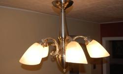 Stainless steal chandelier for sale asking $65.00 paid $140.00.