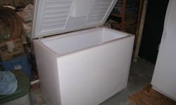 Wood chest freezer - in great shape; outside measurements - 42" long; 34" high; 22" deep.  Clean and has been in use until now.  About 10+/- cubic feet.  $75.00