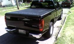 Used Chevy Colorado Tonneau cover.  This was on my leased truck for 3 years, when I gave the truck back I kept the cover.  This cover will fit the regular cab and extended cab models.  This is the actual Chevrolet accessories model from the Chevy dealer,