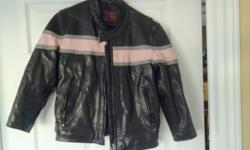 Childs matching leather jacket and chaps. The jacket is size 4XL kids and the chaps are small ladies (These seem to run small).