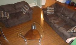 Matching suede sofa and love seat in chocolate brown color. These couches are in excellent shape and only 1.5 years old. It's a really nice set that matches any living space. Comes with cleaning kit. I'm asking $250 for both o.b.o