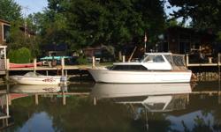 31 foot 1969 Chriscraft Mahogany Constellation boat for sale.  We have had the boat for the last 7 years.  Engines are Chevy 327 Q series.  Large swim platform, anchor pulpit. Hard top with new canvass in 2006.  Fridge, stove, head. Sleeps 6. 
We have