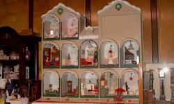 This Christmas house lights up when button is pushed and held. All hand-crafted furniture and accessories are included. It is half inch to one foot scale. The dimensions are 24? tall X 24? wide X 10.5? deep. The price is $50.00 O.B.O.
519-733-0094