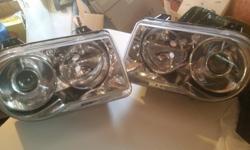 Chrysler 300 HID Projector Head Lights ( fits 2005-2010) very good condition some signs of road wear but clear lenses. Asking $150.00