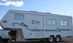 Snowbird special. all season 5th wheel.
  Heated tanks, double pane windows
  Very clean
  Large slide.
  sky light in kitchen and bathroom
  Lots of storage, inside and out.
  Good storage in kitchen.
  Closet inside front door.
  Large fridge