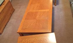 Wood coffee table (24" x 48" x 15" high) and two matching end tables (22" x 18" x 18" high).