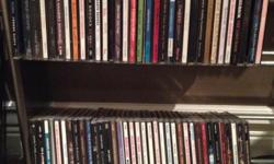 A collection of over 65 CD's , see photos for selection.