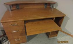 Computer Desk for Corner. Three drawers, with pullout keyboard. Very Nice Condition.