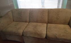 2.5 years old couch. Selling for 50.00 or best offer. Call Edna at 403-992-8023. 248 MacEwan Glen Drive NW.