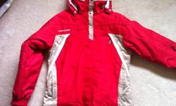 Almost new women's size 6 high end Couloir Pinnacle ski jacket. Red with tan and white highlights. Worn approx 4 times. No damage, wear or stains. Seam sealed, machine washable, snowskirt, lots of pockets, passholder, under arm vents. Retails at $450 new.