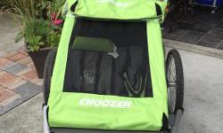 Croozer Kid for 2 is a versatile and practical child carrier that can be used as a jogger or stroller. Can easily be used as a one or two seater, carrying up to 45kg combined weight of children and cargo. Includes rain cover. A tow bar (not included)