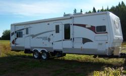 OBO,  Paradise Point, 32 Foot Travel Trailer, with 2 pullouts, all aluminum construction, fully winterized, 1 piece rubber roof with R-21 insulation, R-21 insulated floors, R-14 insulated walls with 2 layers of Luan board staggered for seamless walls,