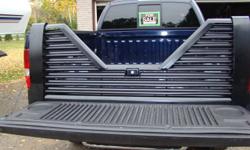 Custom Flow 5th Wheel Tailgate
-brand new (bought another truck)
-lockable with key
-black
-fits Ford F150  2004-2008